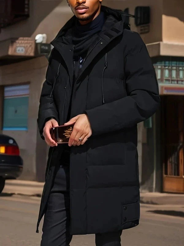 Stylish men's long padded coat. Insulated winter jacket for ultimate warmth and cold weather protection.