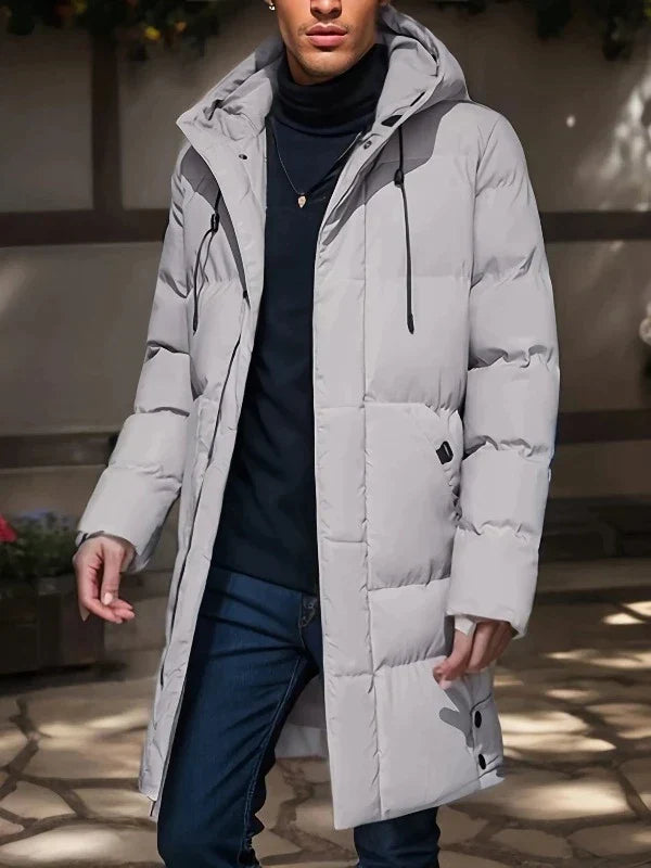 Durable men's insulated winter jacket. Warm padded long coat for cold weather gear & men's fashion.