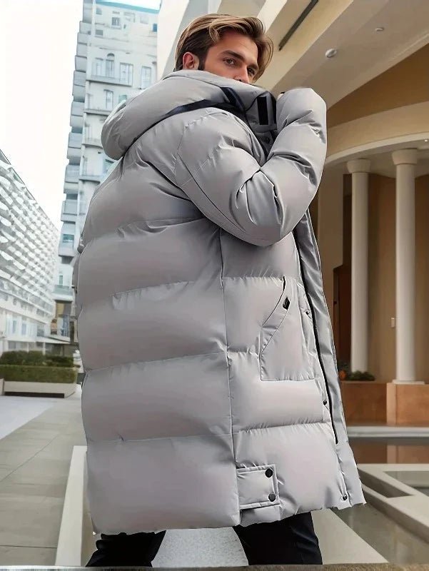 Elegant men's long padded coat. Essential warm insulated outerwear for winter & cold weather.