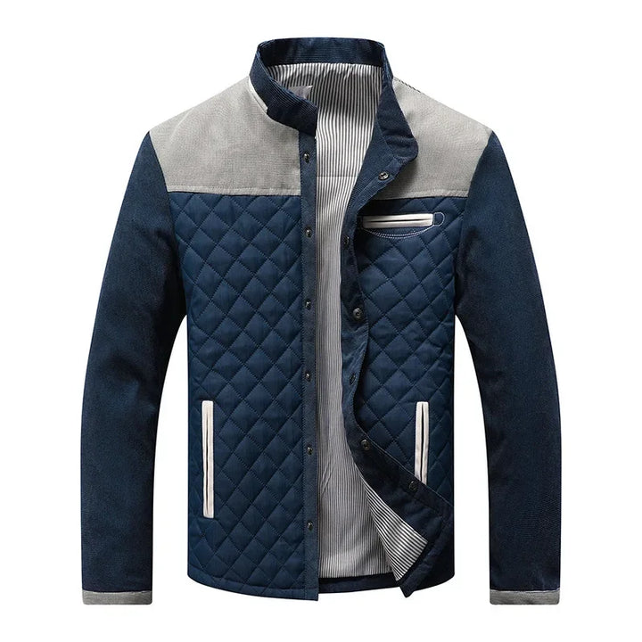 Gray men's insulated quilted winter jacket. Warm, durable outerwear designed for ultimate comfort in cold weather.