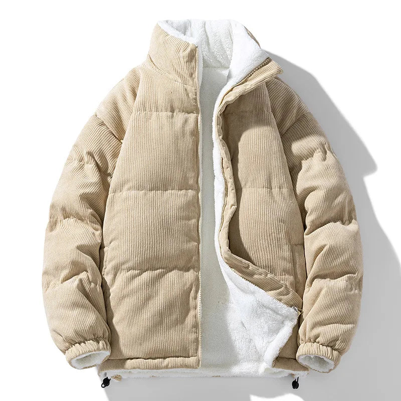 Close-up of a men's textured puffer jacket fabric and robust zipper, showcasing quality and warmth for winter.