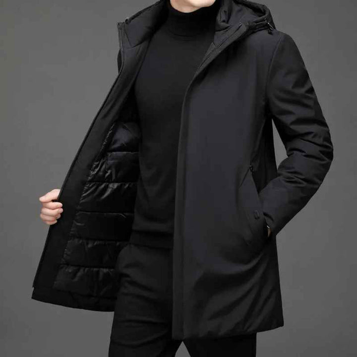 Insulated men's hooded winter jacket, offering ultimate warmth and protection against extreme cold weather.