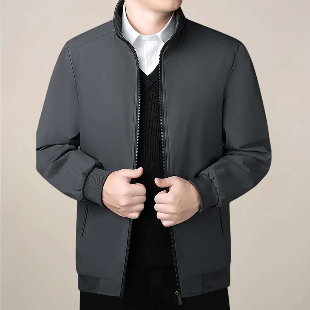 Men's warm zip-up winter jacket with stand collar, perfect for cold weather & outdoor activities.