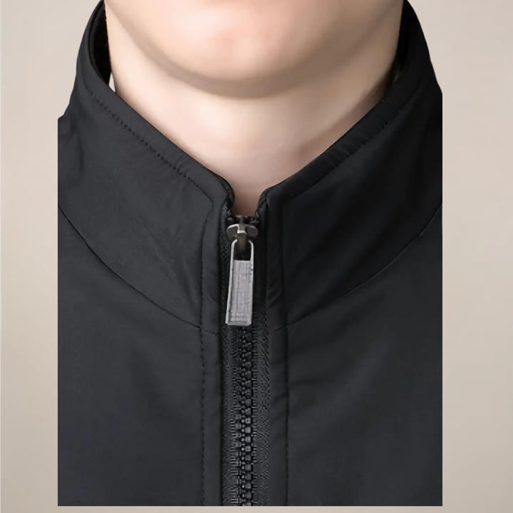 Modern men's warm zip-up jacket with stand collar, perfect for chilly outdoor adventures.