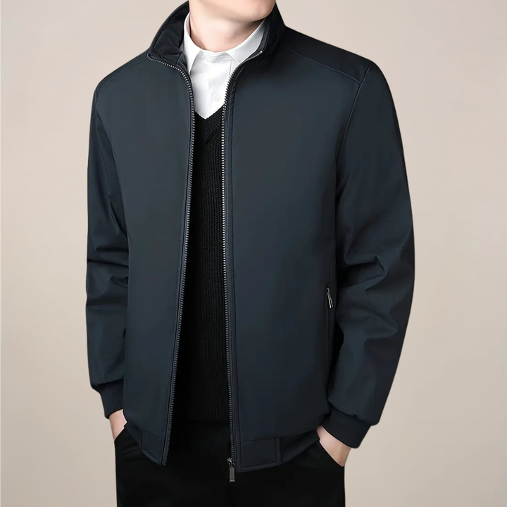 Versatile men's fall fashion outerwear, a warm zip-up winter jacket with a sleek stand collar.