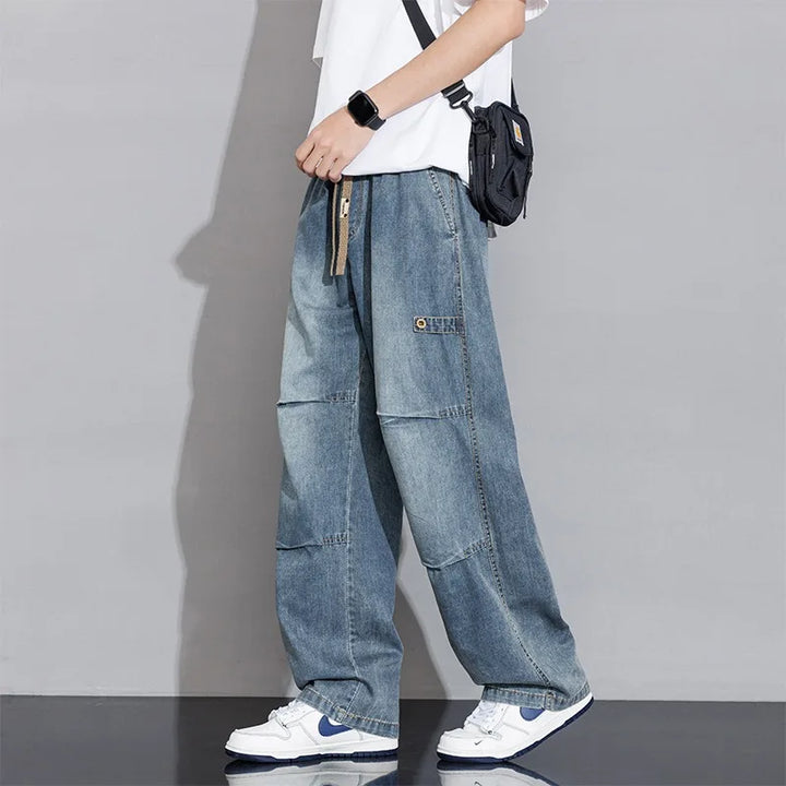 Men's washed wide-leg jeans, relaxed fit, drawstring waist. Perfect for casual everyday wear.