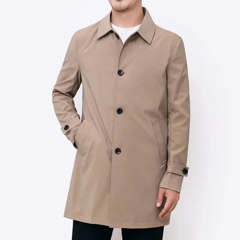 Back view of men's classic khaki trench overcoat, showcasing the timeless design and sleek fit for all-weather style.