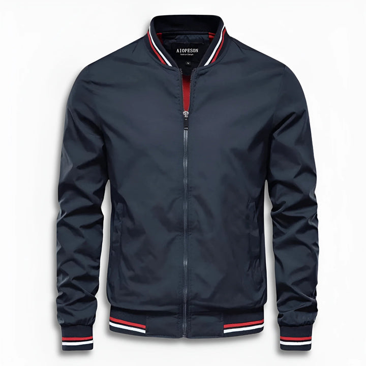 Close-up of men's water-repellent transition jacket's stand-up collar. High-quality fabric detail.
