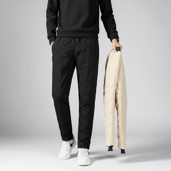 Detailed view of the fabric texture on men's waterproof fleece-lined jogging pants, for ultimate warmth