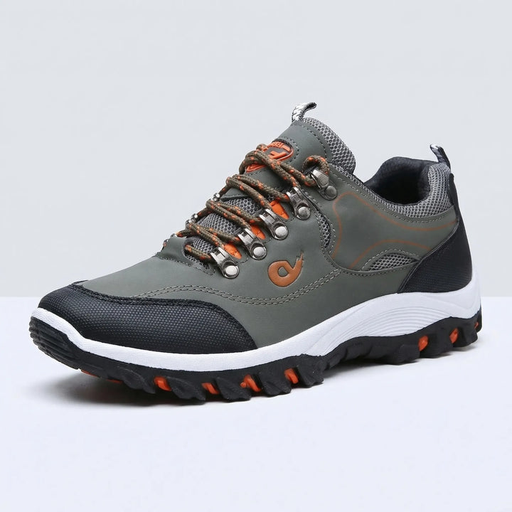 Low-cut men's waterproof athletic shoes for trail running & walking, featuring slip-resistant durability.