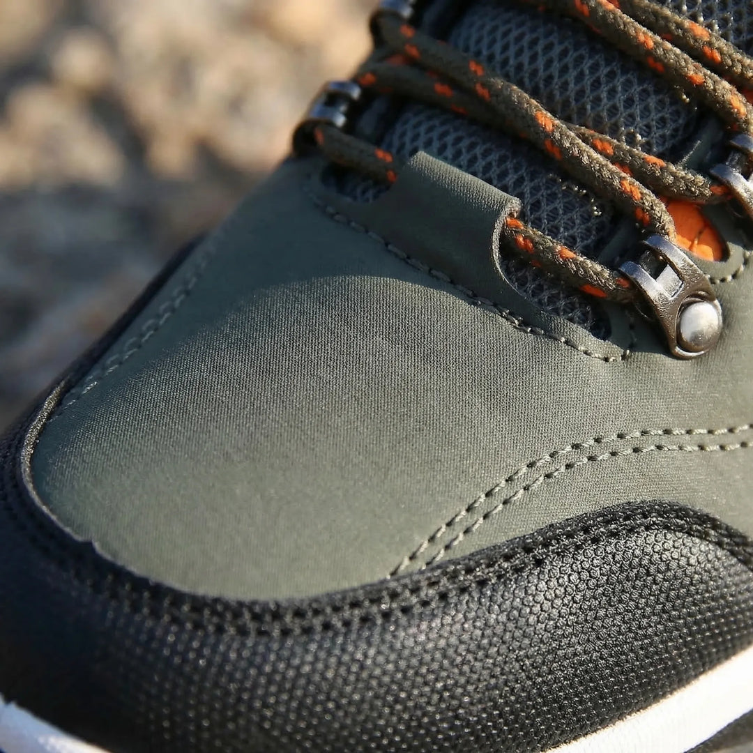 Versatile men's outdoor hiking shoes, waterproof & comfortable for all-weather trekking and trails.