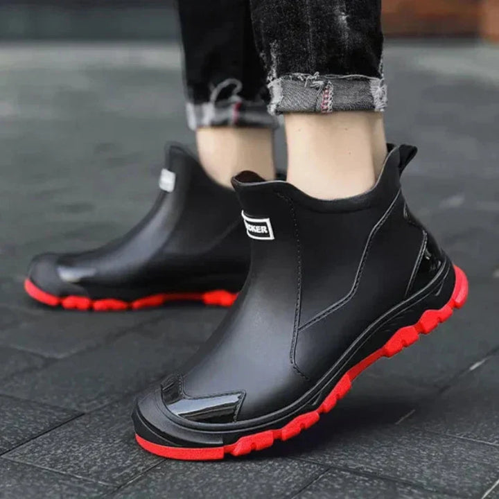 Rugged sole of men's outdoor work boots. Waterproof, insulated, providing grip in cold, tough winter terrain.