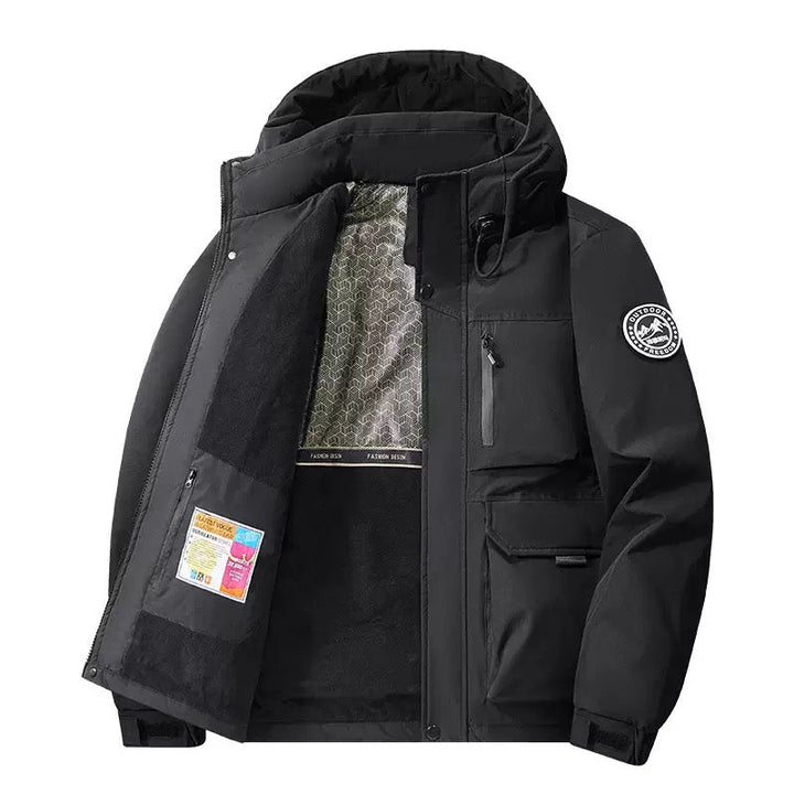 Stylish hooded men's insulated winter coat with utility pockets, designed for cold, wet weather.