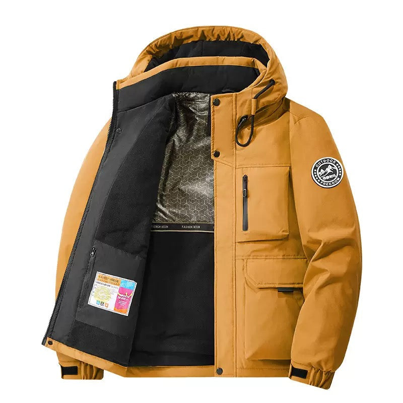 Close-up of a men's insulated winter coat showing waterproof fabric texture, hood, and practical pockets.