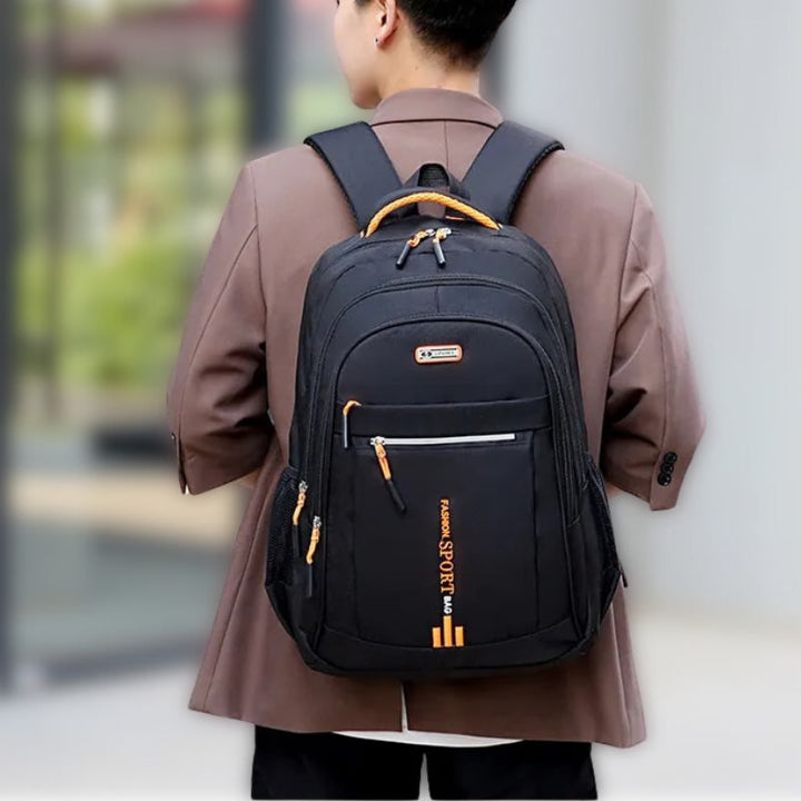 Stylish men's durable waterproof backpack with laptop compartment, perfect for travel.