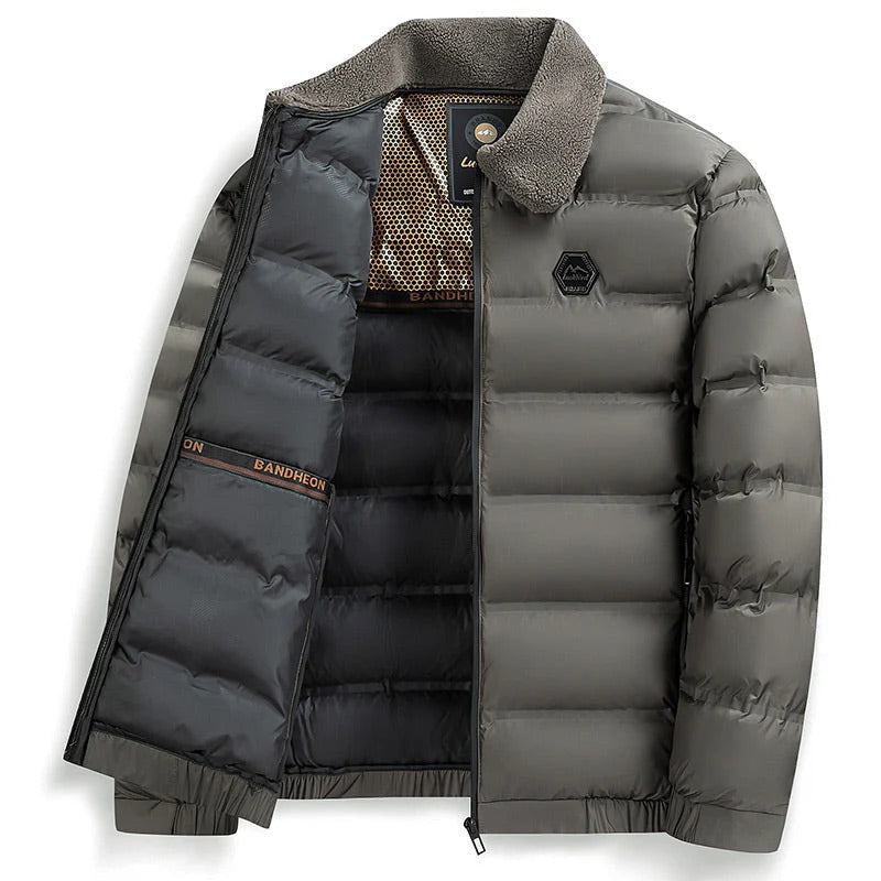 Warm men's waterproof padded winter jacket, offering ultimate protection against cold weather. Insulated comfort.