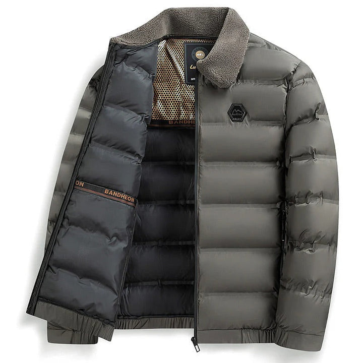 Warm men's waterproof padded winter jacket, offering ultimate protection against cold weather. Insulated comfort.