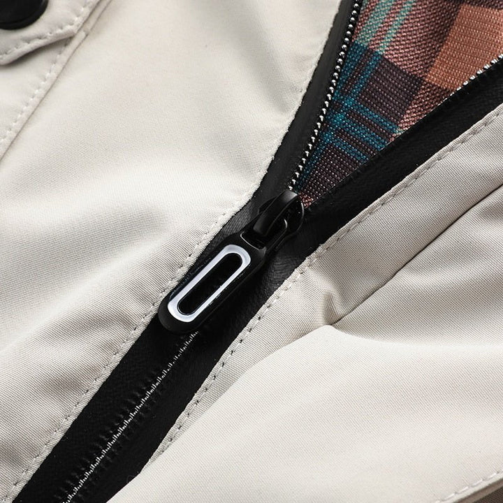 Durable men's waterproof winter jacket, engineered for harsh cold weather & outdoor use. Warm & protective.