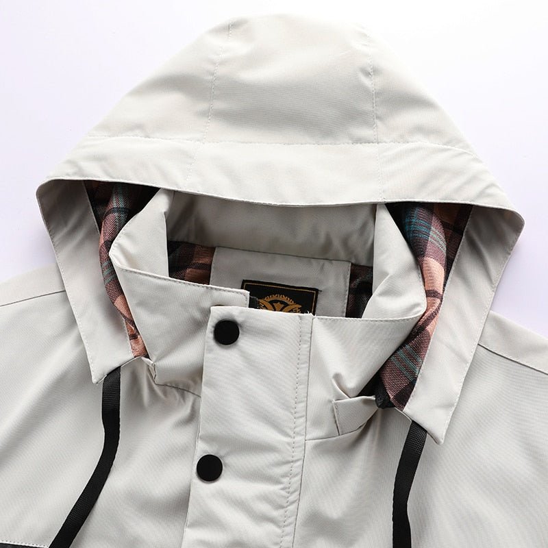 Sleek men's waterproof winter jacket. A stylish & warm cold-weather essential for outdoor comfort & dryness.
