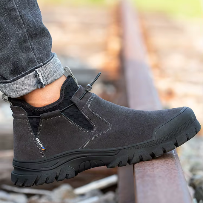 Black West Ridge men's slip-on work boots, steel toe for protection, easy wear.