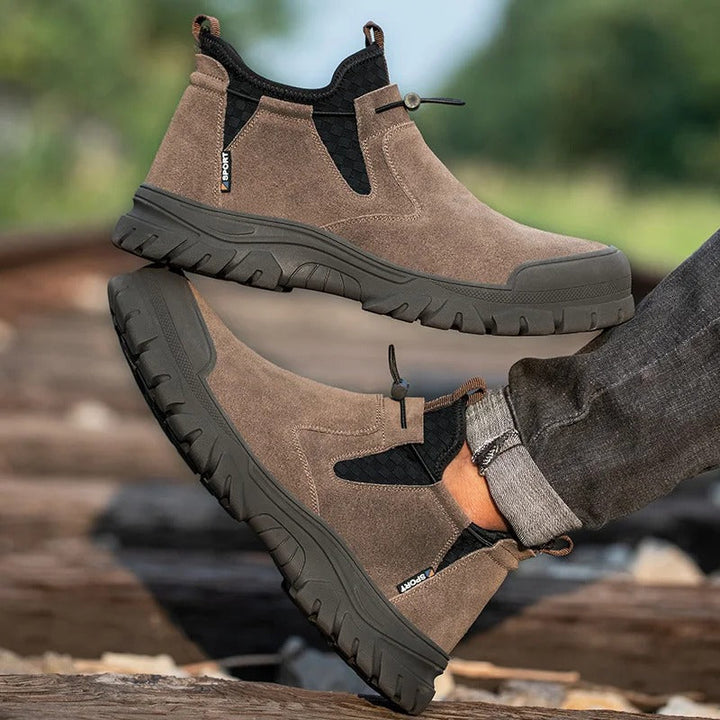 Comfortable West Ridge men's steel-toe slip-on work boots, shock-absorbing for long shifts.