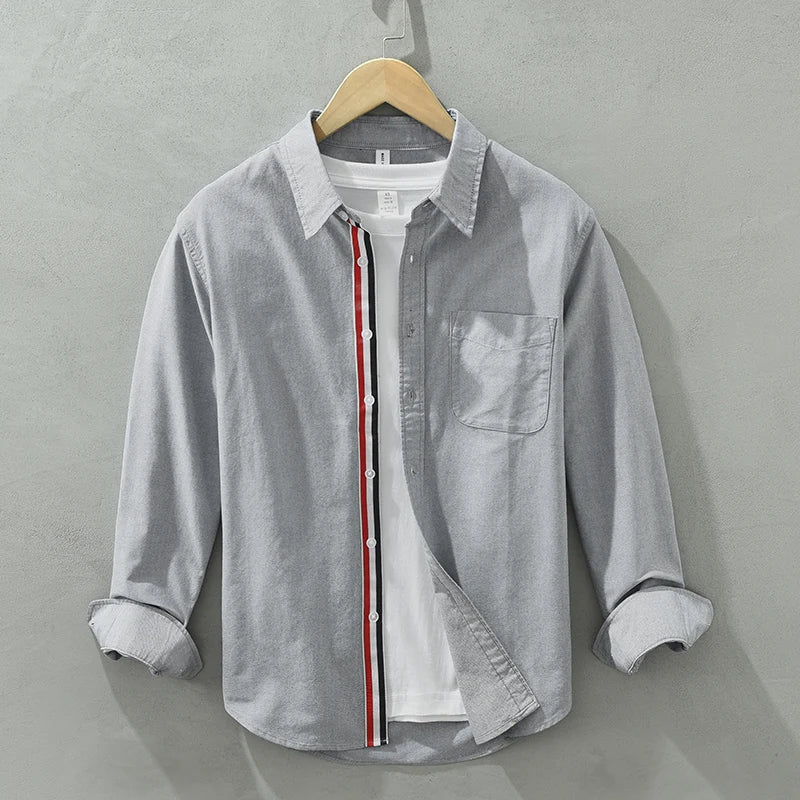 Comfortable gray collared men's shirt with a relaxed fit, ideal for versatile everyday style.