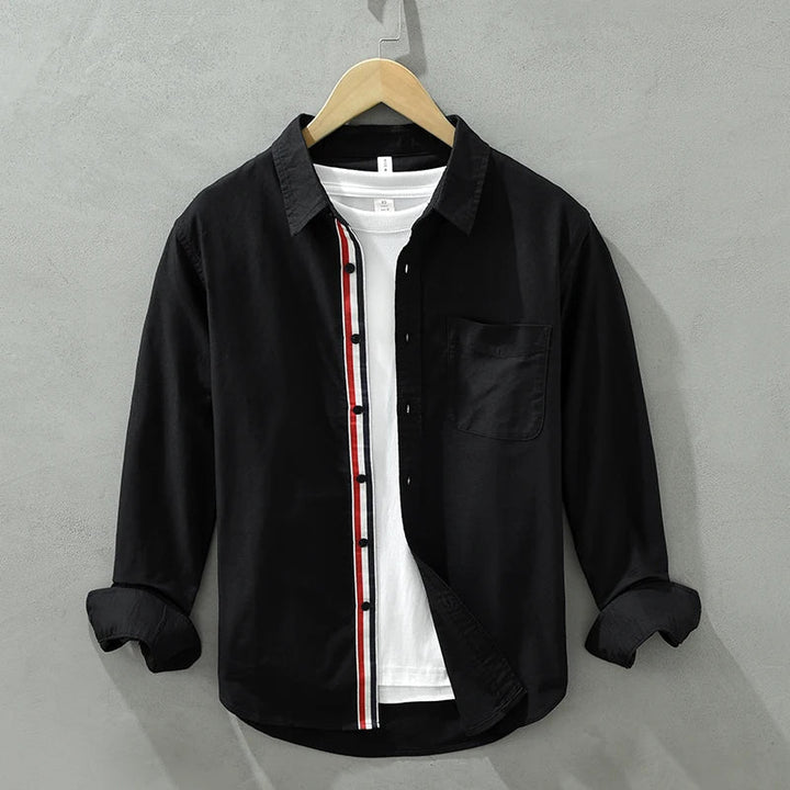 Black men's relaxed fit button-up shirt, a modern and effortless choice for versatile casual wear.