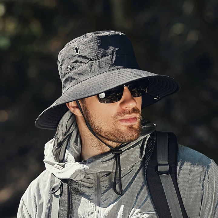 Men's wide brim sun hat with UV protection, adjustable chin strap, ideal for fishing & beach activities.