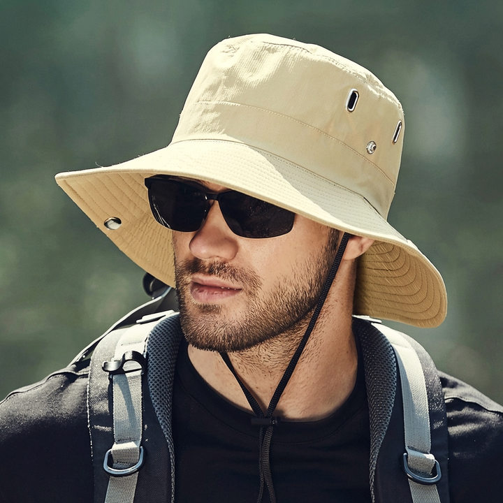 Men's travel-friendly wide brim sun hat offering UV protection, secure chin strap for all outdoor activities.