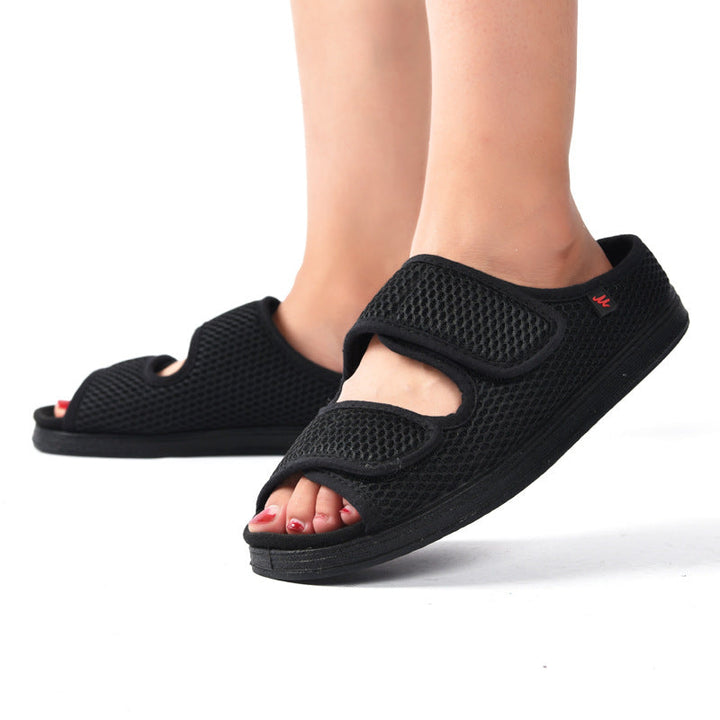 Men's wide fit slip-on comfort walking shoes with adjustable hook-and-loop straps for easy daily wear.