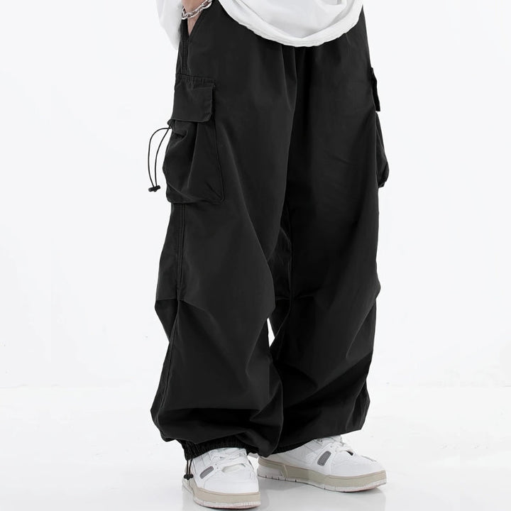 Relaxed fit men's cargo pants, ideal for comfortable outdoor activities or casual streetwear fashion.