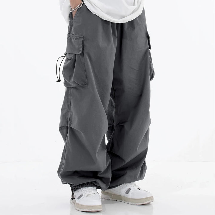 Comfortable men's wide-leg cargo pants with a relaxed fit, versatile for daily & outdoor use.