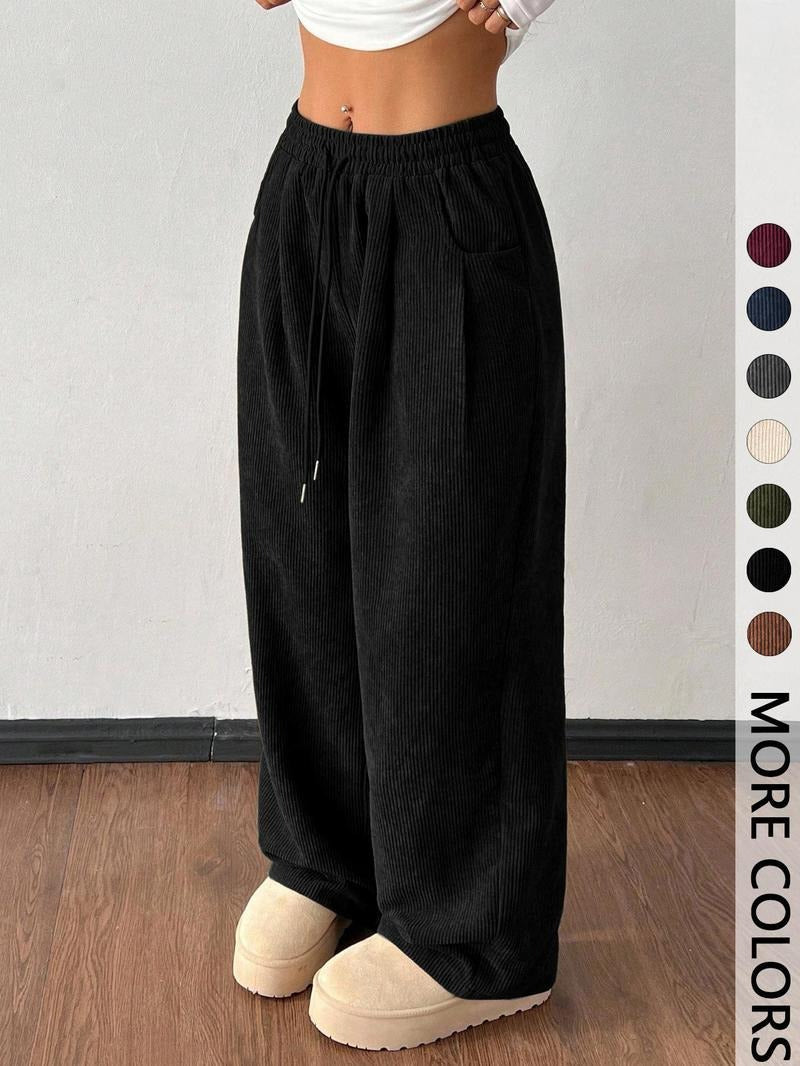 Comfortable men's wide-leg drawstring pants, textured for relaxed everyday wear.