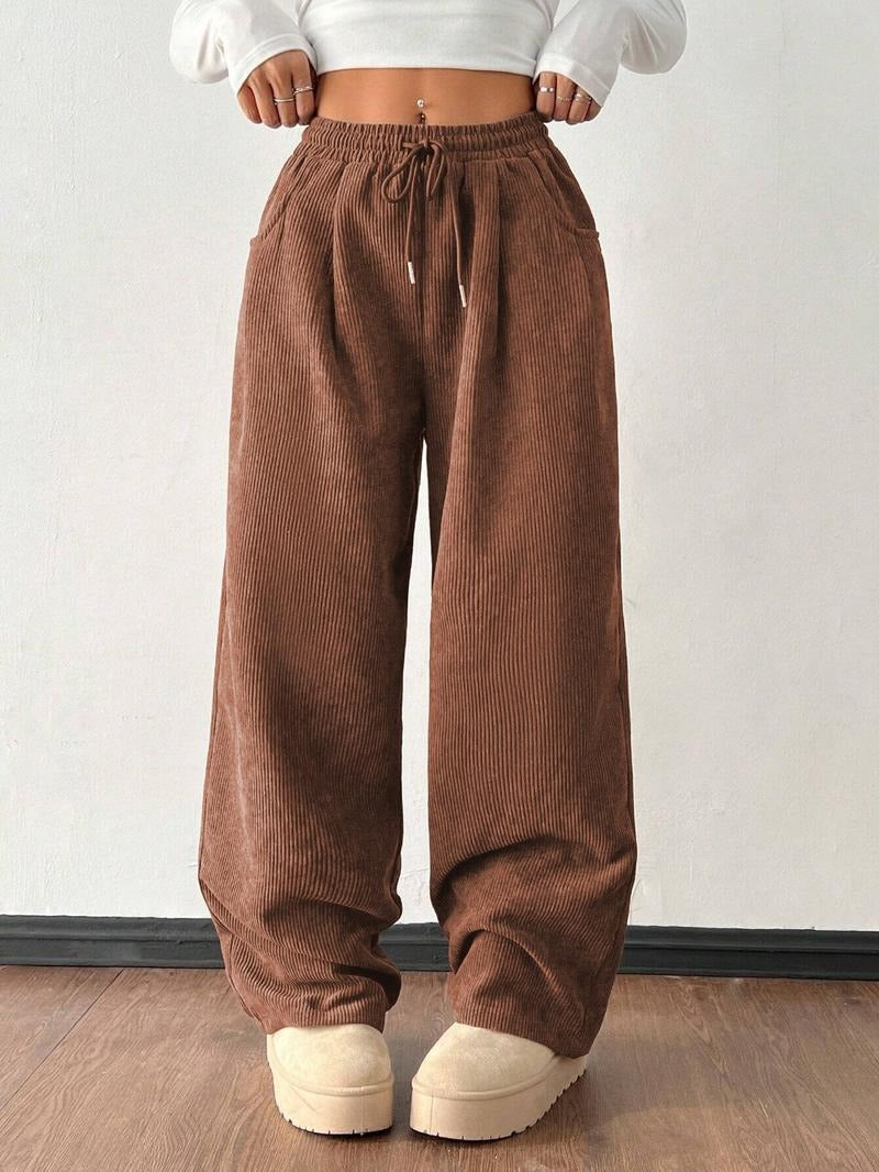 Comfortable, stylish men's wide-leg textured casual pants with a practical drawstring waist.