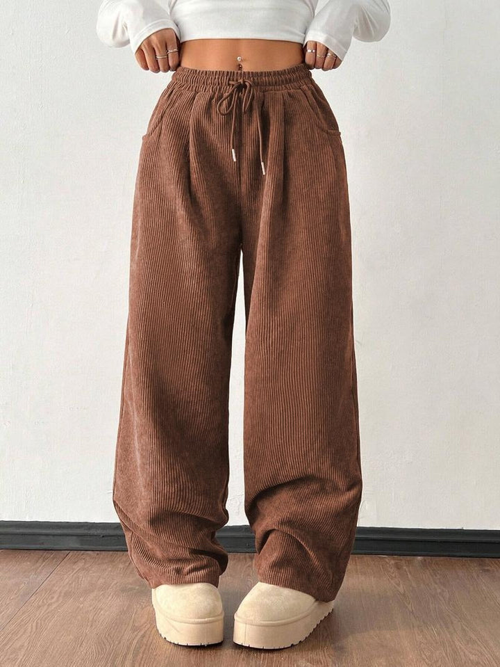 Comfortable, stylish men's wide-leg textured casual pants with a practical drawstring waist.