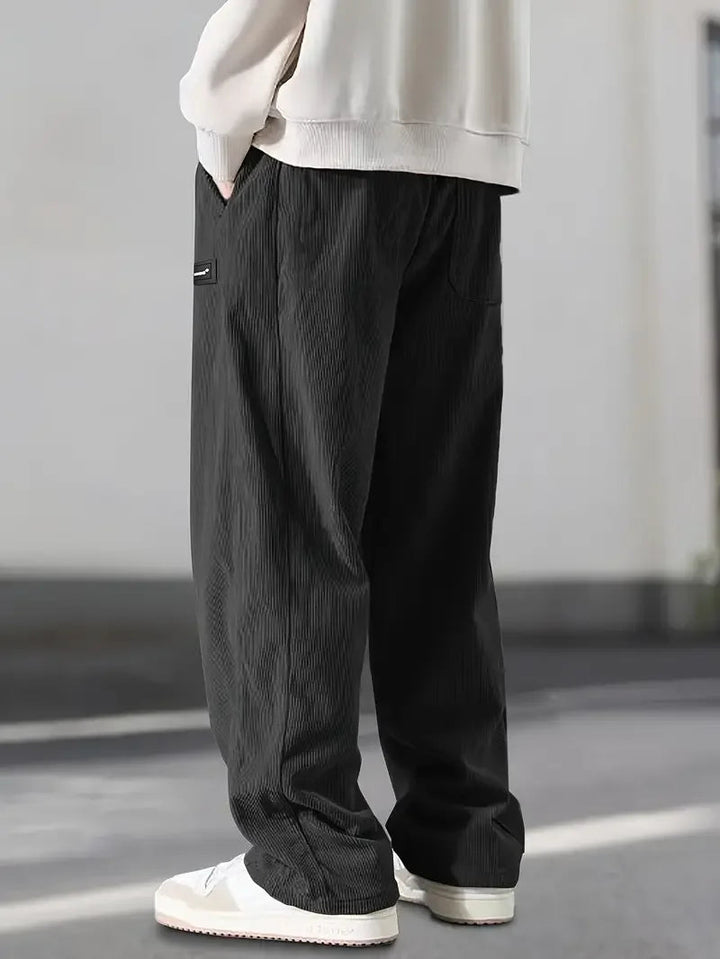 Relaxed fit men's wide leg corduroy pants, comfortable and stylish for streetwear & vintage-inspired outfits.