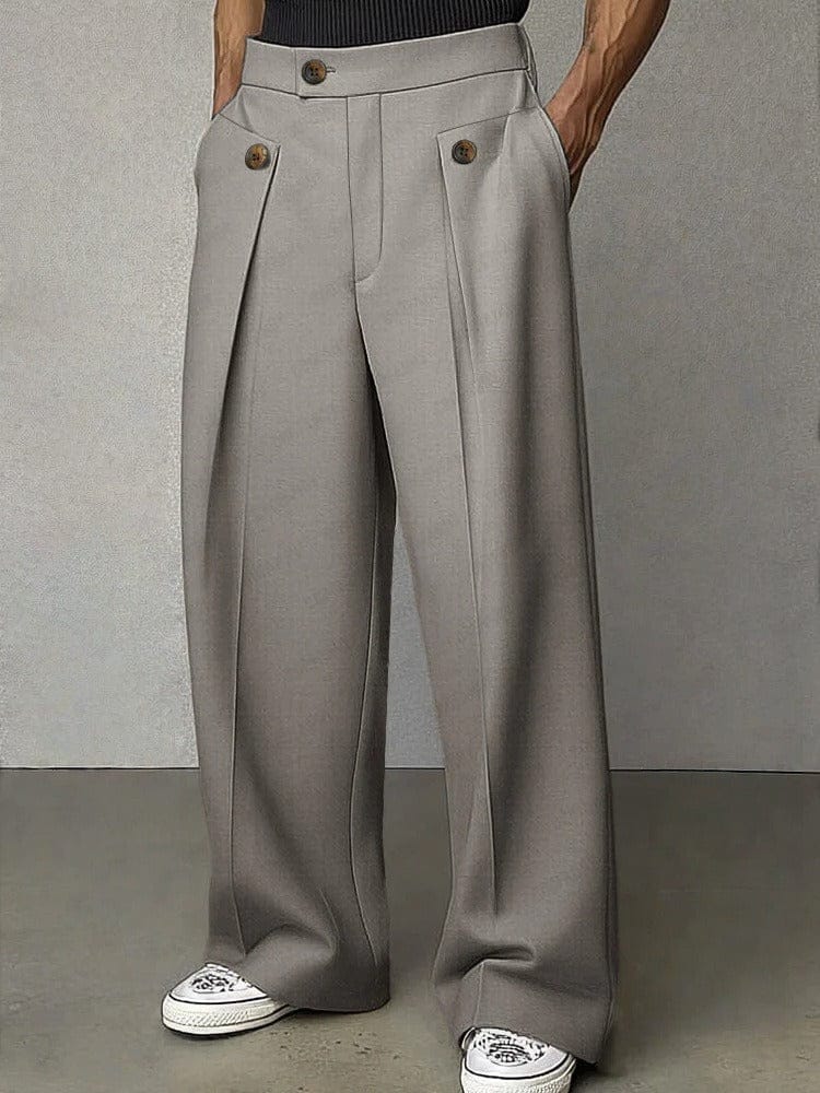 Full-length view of men's modern wide-leg pleated trousers, showcasing relaxed fit & effortless style.