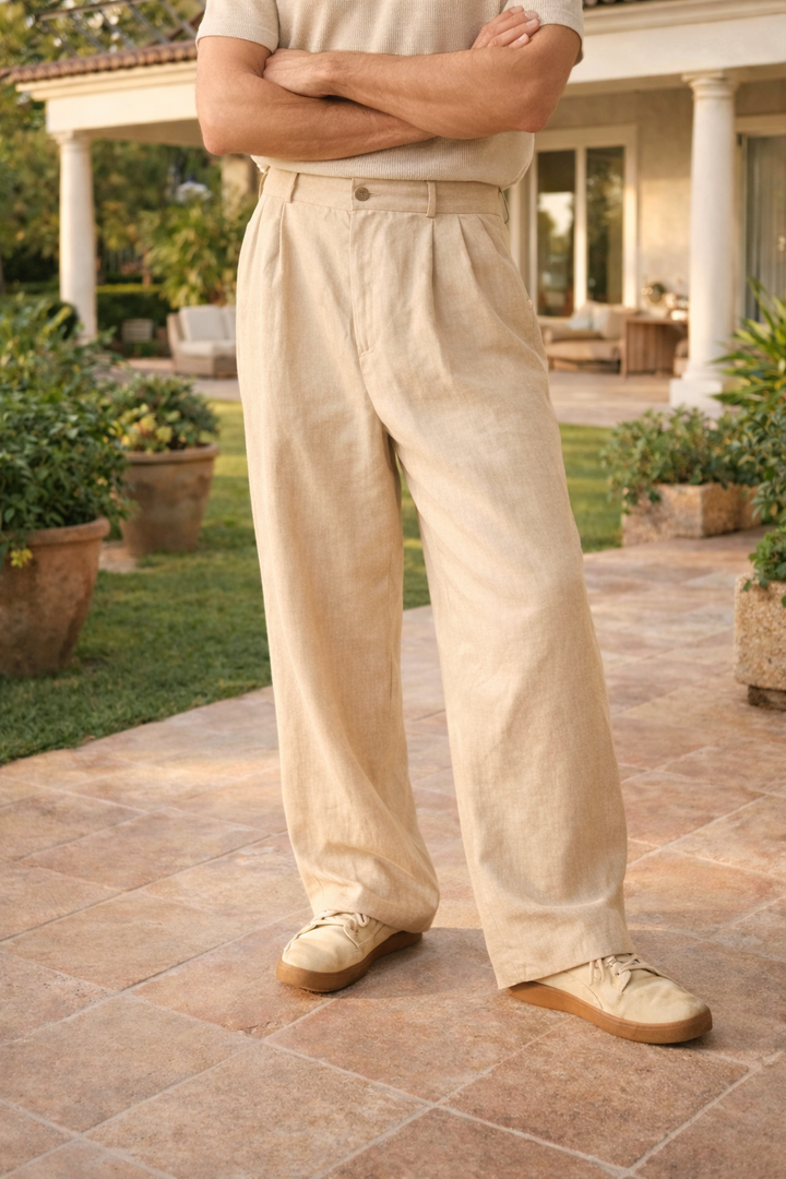 Comfortable men's wide leg pleated trousers for a relaxed fit. Versatile smart casual style for spring/summer.