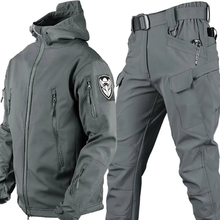Functional men's activewear set, windproof & waterproof for hiking, adventure, and tactical use.
