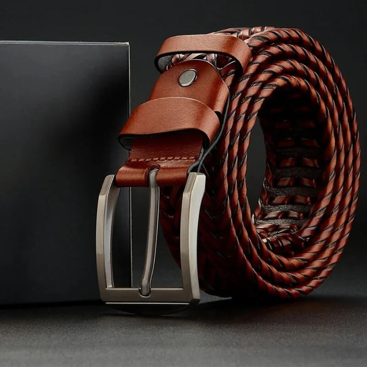 Premium cowhide woven leather belt for men, designed for durability and style, with a polished buckle.