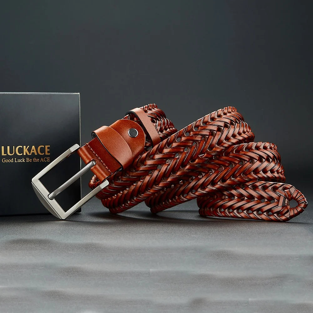 Stylish men's belt: A brown woven leather fashion accessory with a contrasting polished silver buckle.