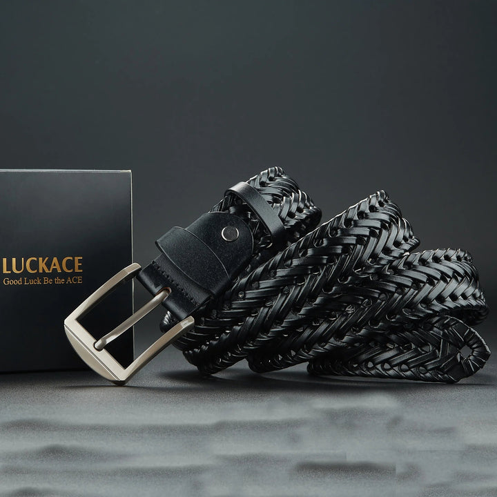 Classic men's woven leather belt in black, featuring a shiny polished buckle. A versatile fashion piece.