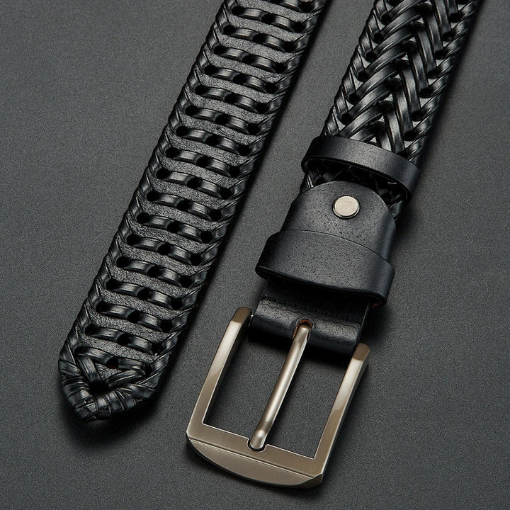 Elegant men's braided leather belt with a smooth polished buckle, a timeless fashion accessory.