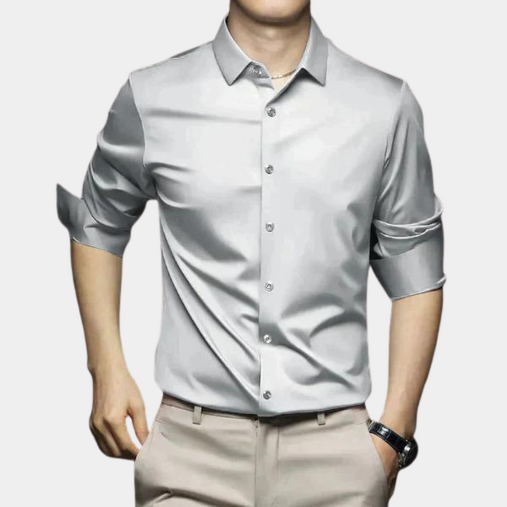 Close-up of the durable, easy-care fabric on a long-sleeve men's wrinkle-free dress shirt.