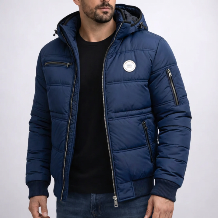 Men's Wyatt durable winter jacket in charcoal, offering effortless style and superior warmth for cold weather.