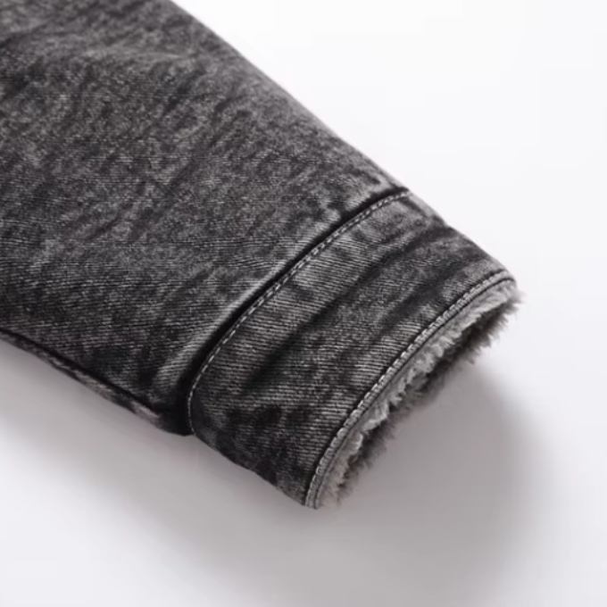 Front button closure detail of Men's Yukon Trucker Jacket, classic and functional outerwear.