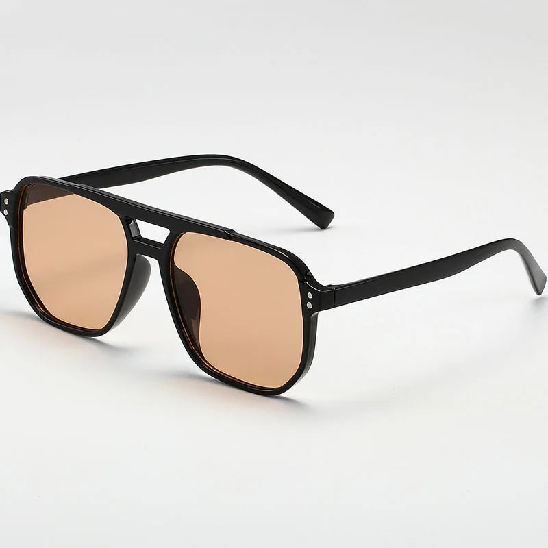 Stylish men's accessory: Zenith Aura UV400 sunglasses for comprehensive outdoor eye protection.