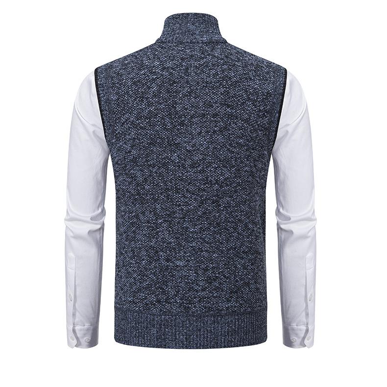 Sleeveless men's knit gilet featuring practical pockets & full zip, great for winter warmth and layering.