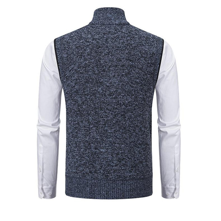 Sleeveless men's knit gilet featuring practical pockets & full zip, great for winter warmth and layering.