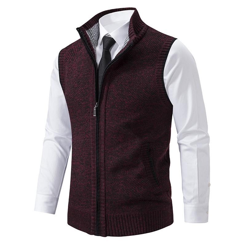 Men's sleeveless knit zip vest, featuring a mock neck and functional design for colder seasons' style.